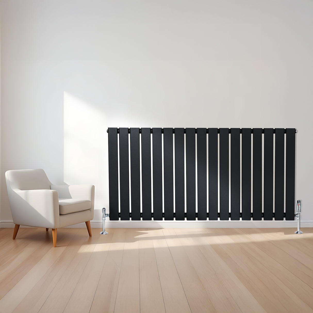 Radiador plano de coluna simples em preto, com design elegante e válvulas, instalado em parede clara ao lado de uma cadeira moderna