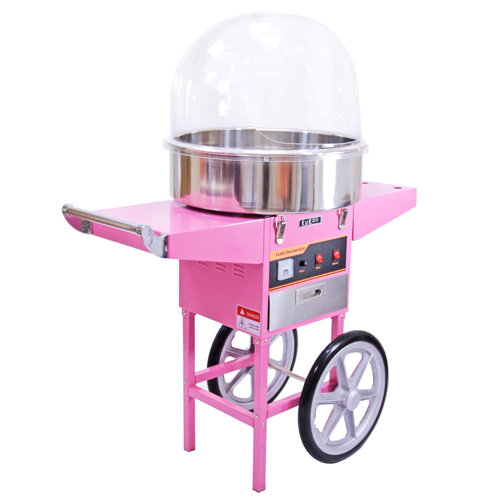 Máquina de algodão doce rosa com estrutura metálica, cúpula transparente e rodas, ideal para festas e eventos, com botões de controle
