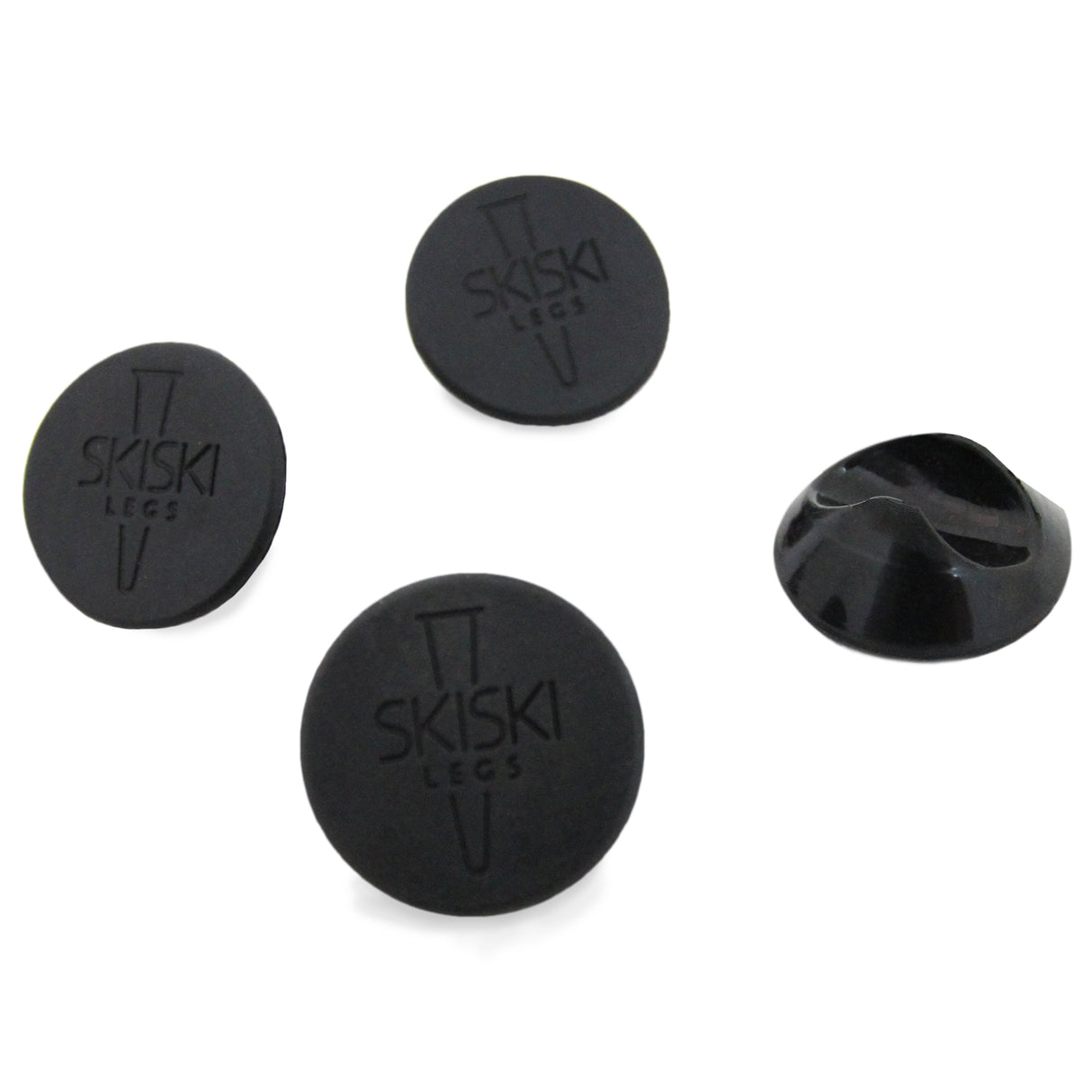Protetores de pés de mesa pretos de 12 mm, em formato redondo, com textura lisa e logotipo SKISKI em relevo, ideais para proteção de superfícies