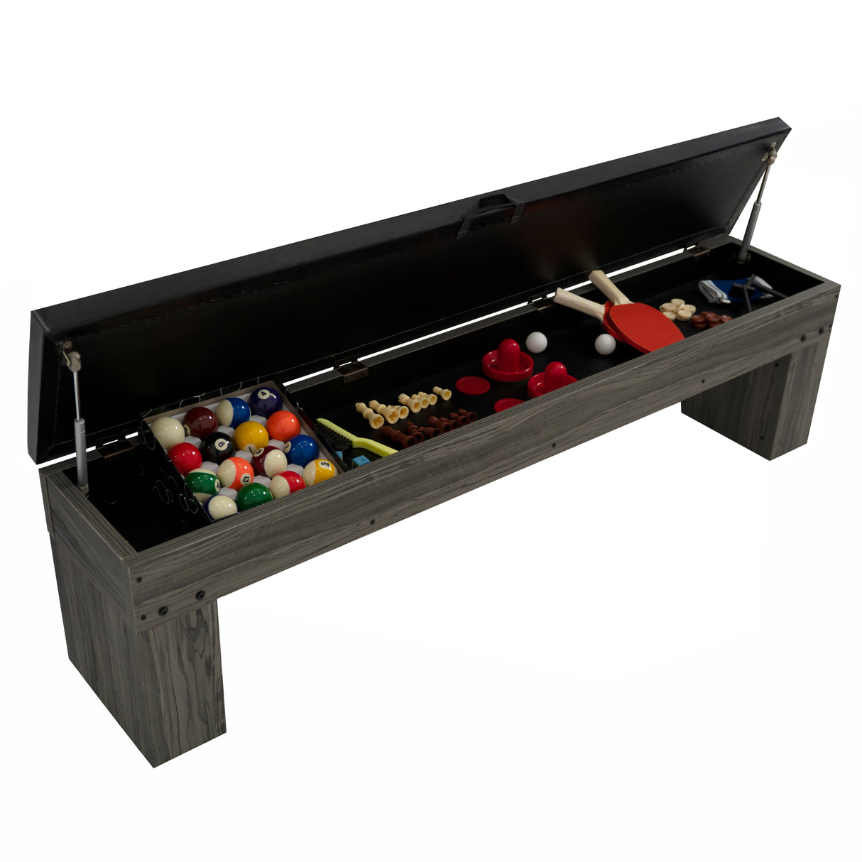 Mesa de jogos cinza com dois bancos, espaço de arrumação embaixo, contendo bolas coloridas e acessórios de jogos variados