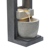 Fonte de água elétrica "Cascade Springs" em tom cinza, com texturas de pedra, jorrando água em cascata para um vaso arredondado