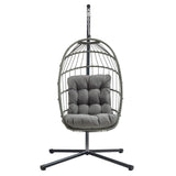 Cadeira suspensa tipo ovo em rattan cinzento, com estrutura metálica e almofada acolchoada, ideal para relaxar em ambientes internos ou externos