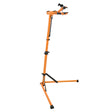 Suporte de oficina para bicicletas em laranja vibrante, com estrutura ajustável e garras pretas para fixação segura da bicicleta