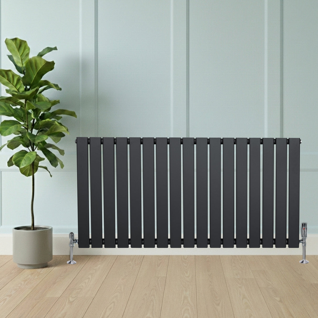 Radiador plano de coluna simples cinza antracite, com design elegante e linhas retas, instalado em ambiente moderno com planta decorativa
