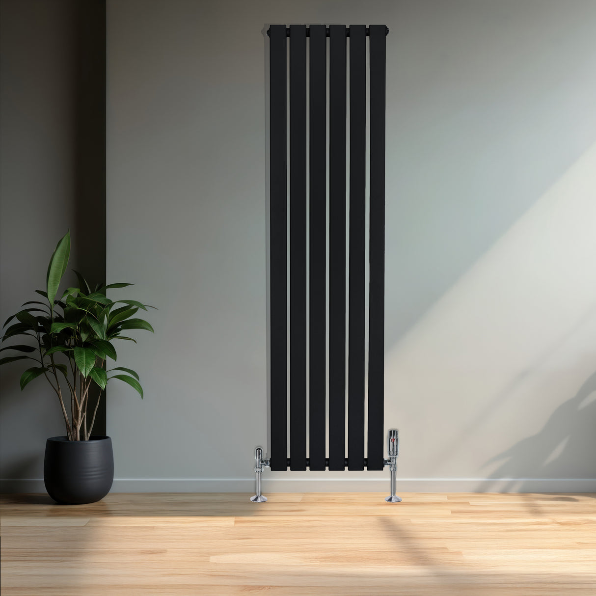 Radiador plano de coluna simples, 1600x420 mm, na cor preta, com acabamento liso e válvulas cromadas, em ambiente moderno e iluminado