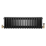 Radiador tradicional de 4 colunas, acabamento preto brilhante, com válvulas de metal dourado, design elegante e funcional