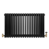 Radiador tradicional de 4 colunas, acabamento preto, com válvulas douradas, ideal para aquecimento eficiente e elegante em ambientes diversos