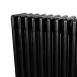 Radiador tradicional de 4 colunas em preto, com acabamento liso e brilhante, ideal para aquecer ambientes com estilo clássico