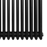 Radiador tradicional de 4 colunas em preto, com acabamento liso e brilhante, ideal para aquecimento de ambientes com estilo clássico