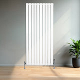 Radiador de coluna única branco, 1600 mm x 700 mm, com design vertical e acabamento liso, instalado em ambiente moderno com planta decorativa