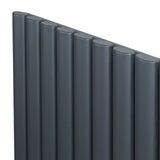 Radiador oval de coluna simples em cinza antracite, com acabamento liso e formato tubular, ideal para aquecimento eficiente