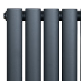 Radiador oval de coluna simples em cinza antracite, com acabamento texturizado e design moderno, ideal para aquecimento eficiente
