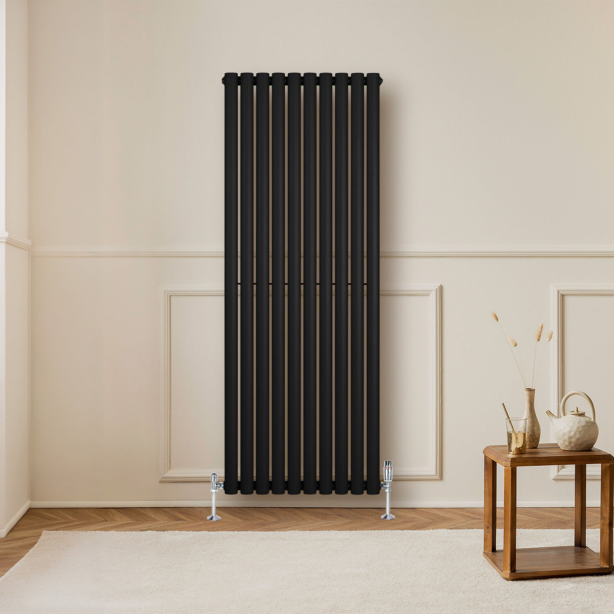 Radiador de coluna simples oval preto, 1600 mm x 600 mm, com design elegante e acabamento liso, instalado em ambiente moderno