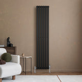 Radiador de coluna simples oval preto, 1800 mm x 360 mm, com design elegante e acabamento liso, instalado em parede clara
